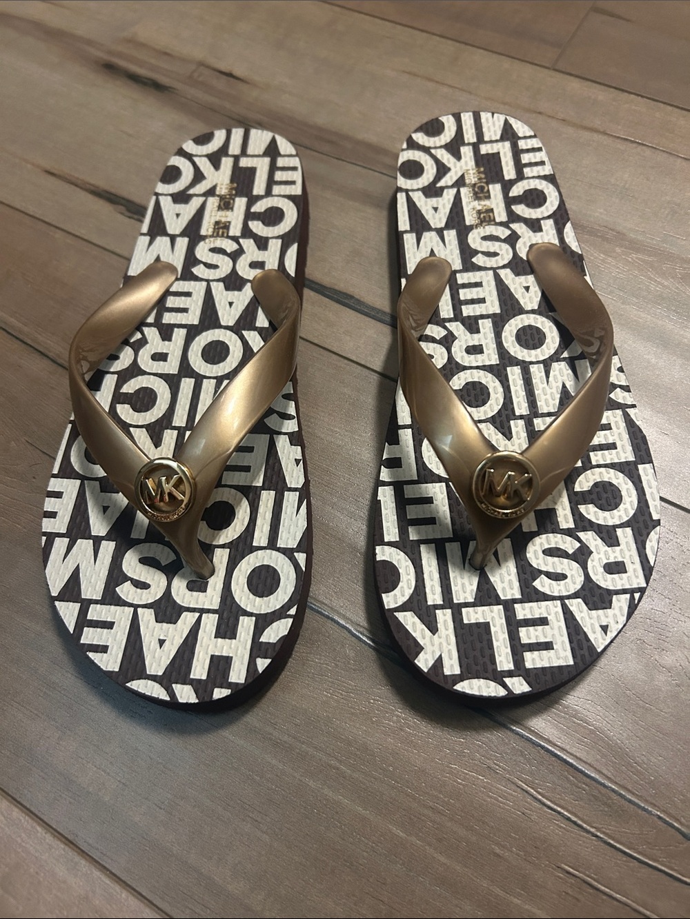 Michael Kors Gold Strap Flip Flops with Brown and White Logo Footbed